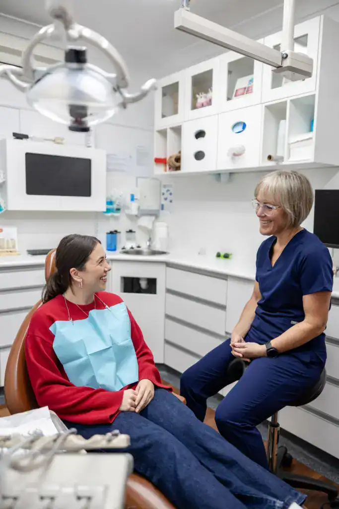 A patient and clinician talking in the surgery